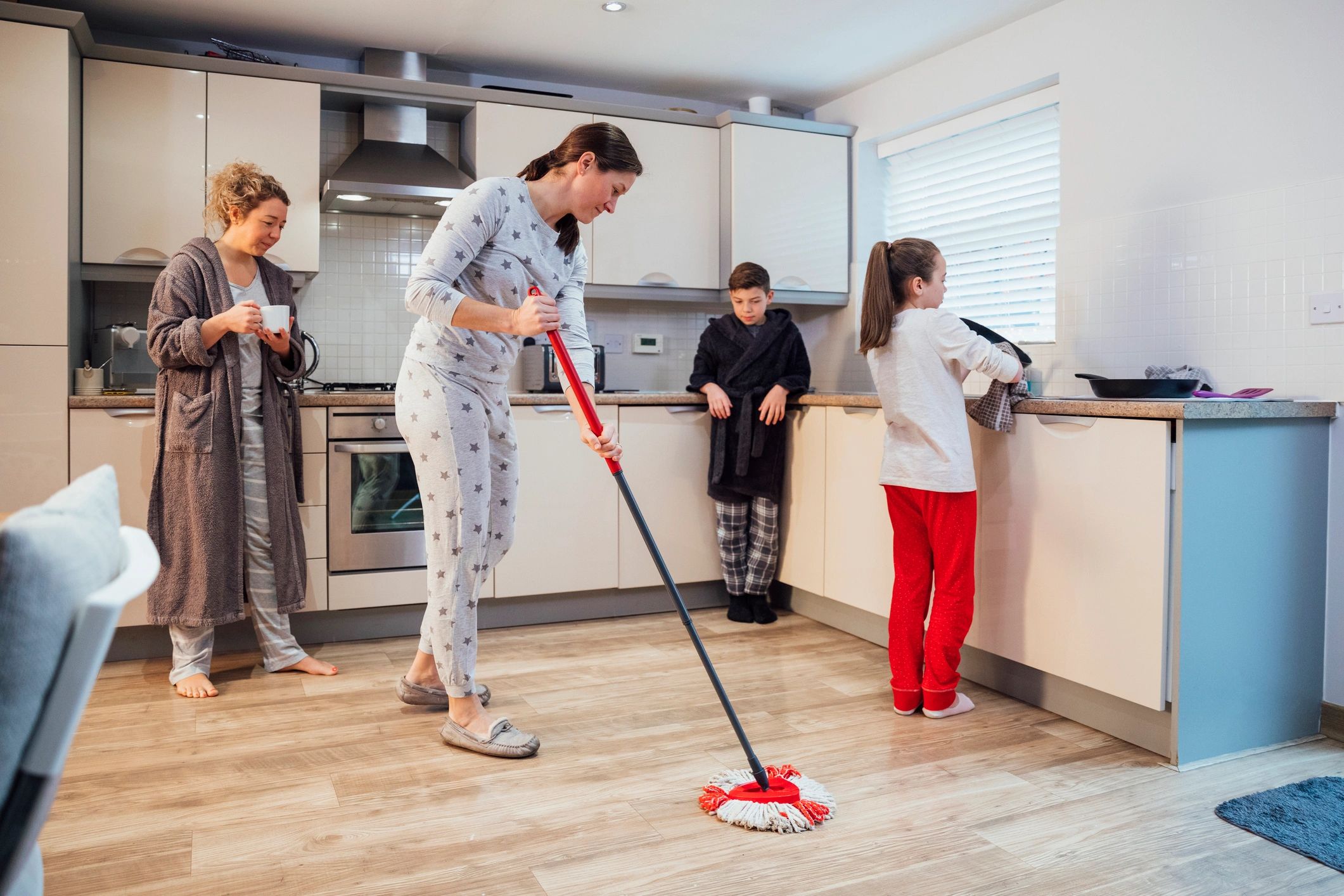 Home cleaning service in a residential kitchen